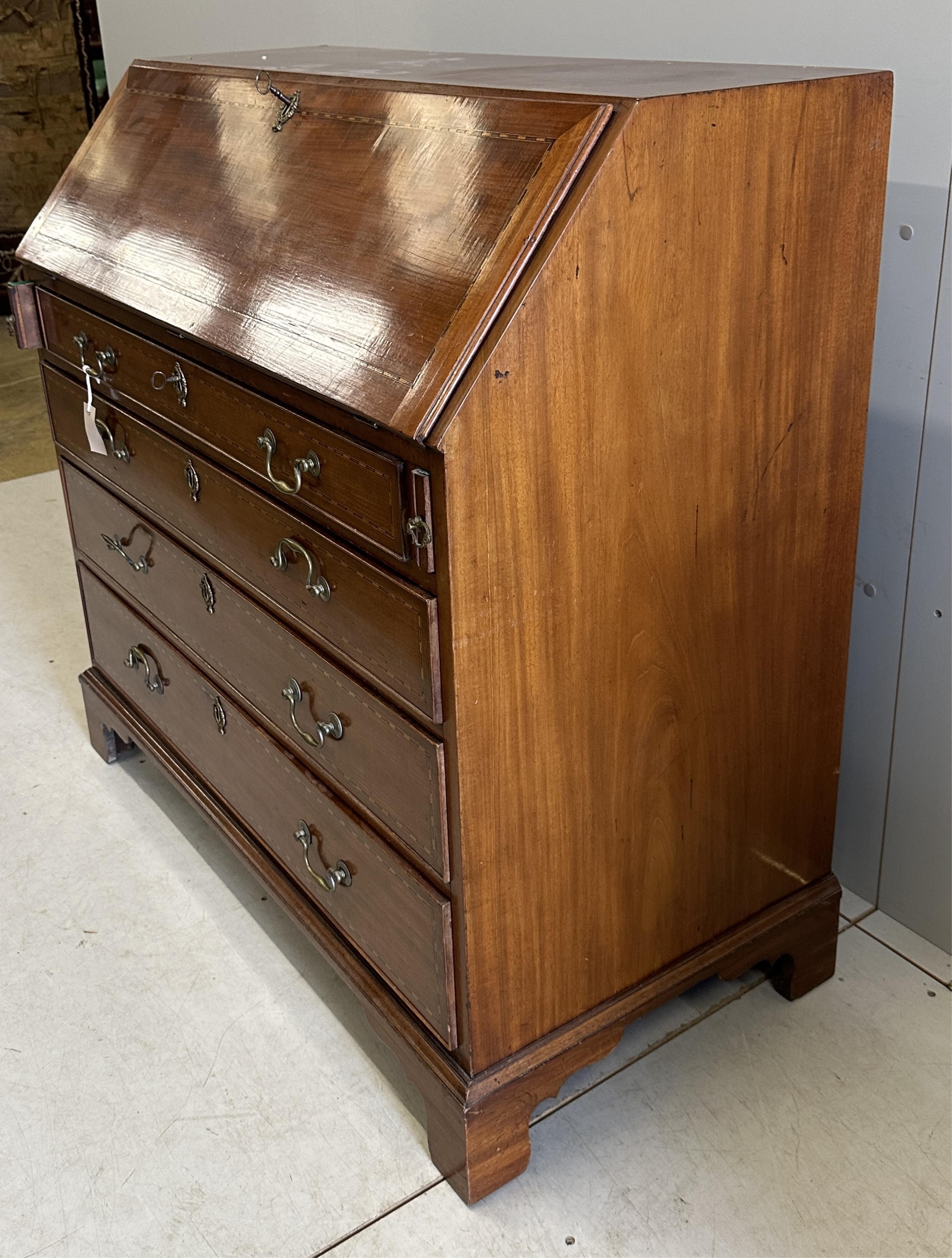 A George III mahogany bureau, width 108cm, depth 54cm, height 107cm. Condition - good, interior fair